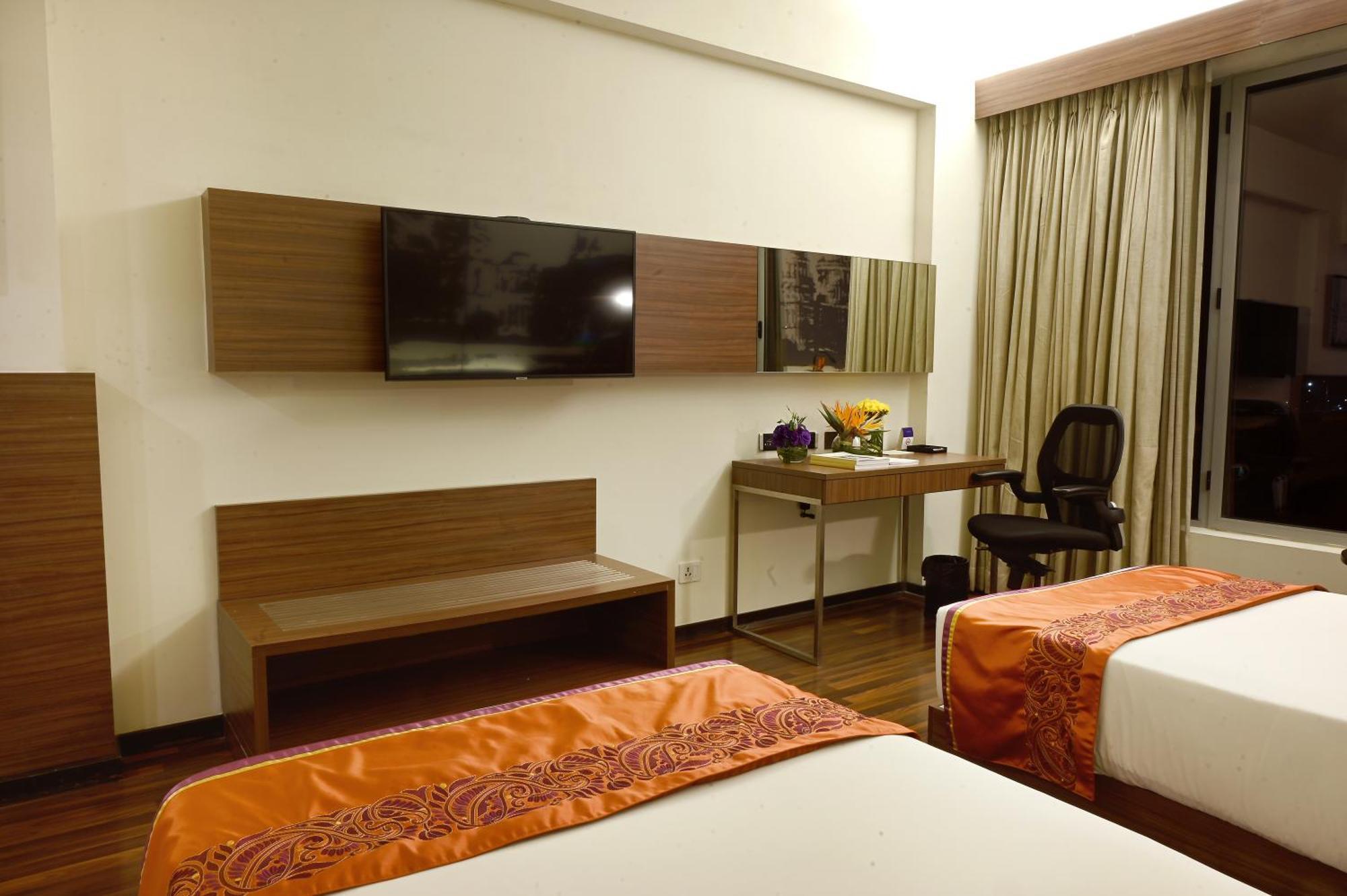 Vivanta Kolkata Em Bypass Kültér fotó A room at the hotel